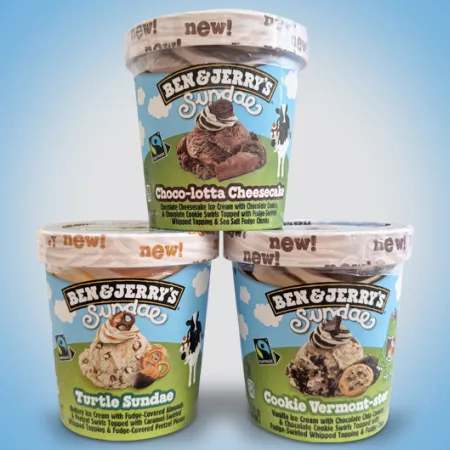 3 Ben & Jerry's Sundaes pints in a pyramid. Flavors included: Choco-lotta Cheesecake, Turtle Sundae, and Cookie Vermont-ster