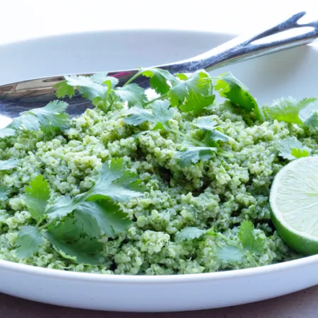 white bowl with cilantro and lime quinoa