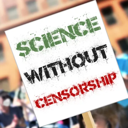 A protest sign reading SCIENCE WITHOUT CENSORSHIP